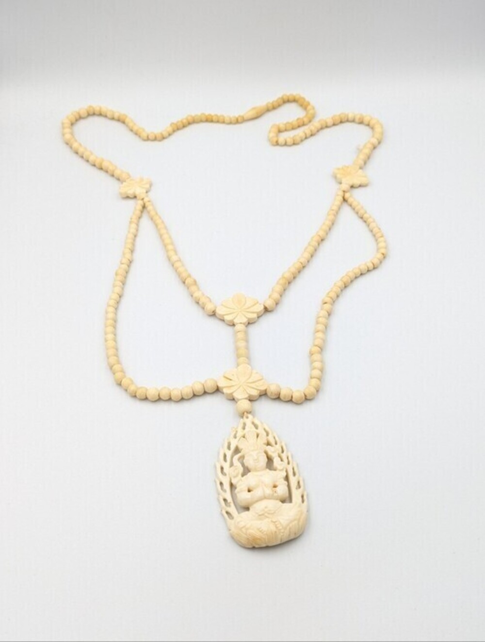Vintage wood bead and carved bone Guan Yin pendant necklace